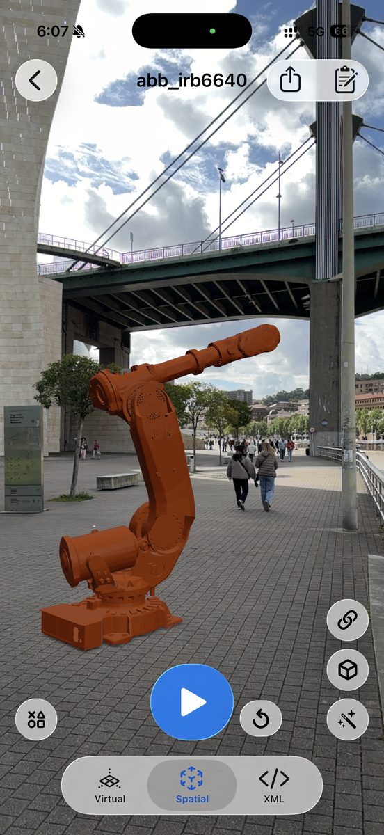 ABB IRB 6640 industrial robot arm URDF simulated with MuJoCo in augmented reality in ARMOR