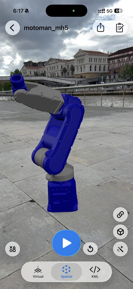 Yaskawa Motoman MH5 industrial robot arm URDF rendered in augmented reality with ARMOR on iPhone