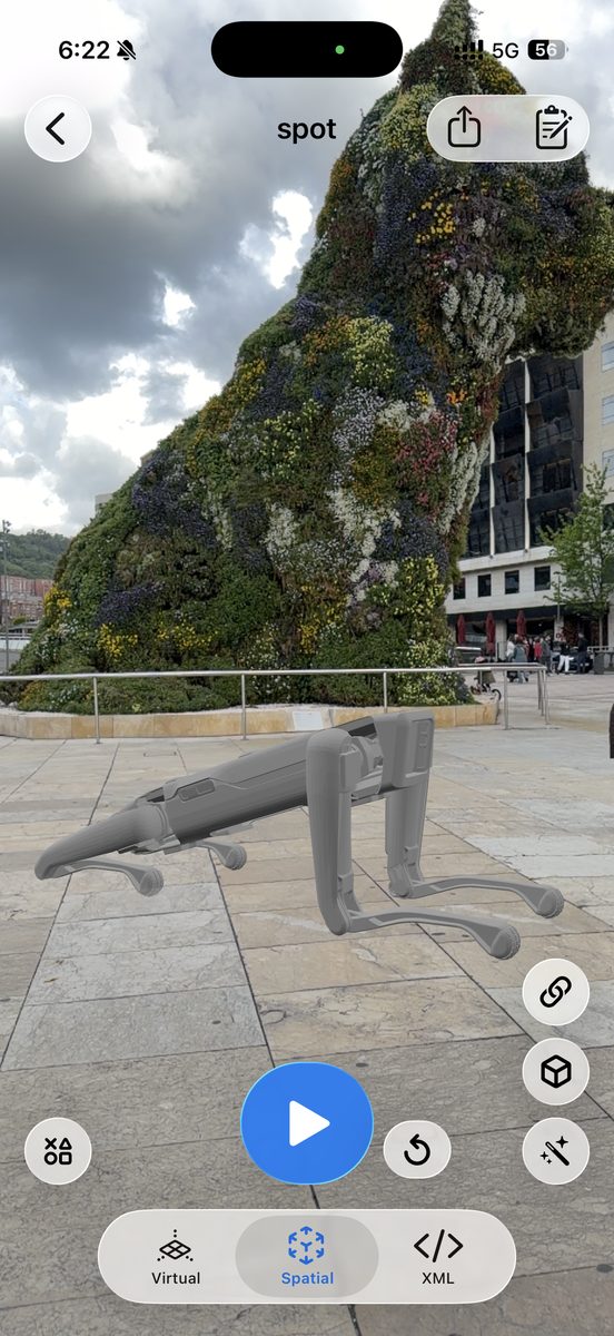 Boston Dynamics Spot quadruped simulated with MuJoCo and rendered in augmented reality on a real-world surface with ARMOR on iPhone